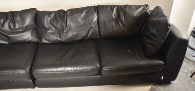 Lot 437 - LIGNE ROSET - A LARGE SEVEN SEATER BLACK LEATHER SOFA