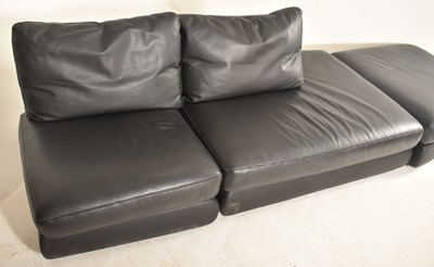 Lot 437 - LIGNE ROSET - A LARGE SEVEN SEATER BLACK LEATHER SOFA