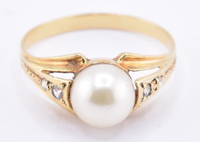 Lot 313 - HIGH CARAT PEARL & WHITE STONE RING