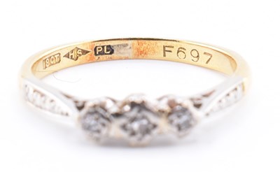 Lot 464 - 18CT GOLD & PLATINUM DIAMOND THREE STONE RING