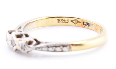 Lot 464 - 18CT GOLD & PLATINUM DIAMOND THREE STONE RING