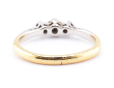 Lot 464 - 18CT GOLD & PLATINUM DIAMOND THREE STONE RING