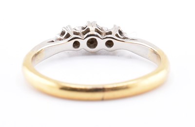 Lot 464 - 18CT GOLD & PLATINUM DIAMOND THREE STONE RING