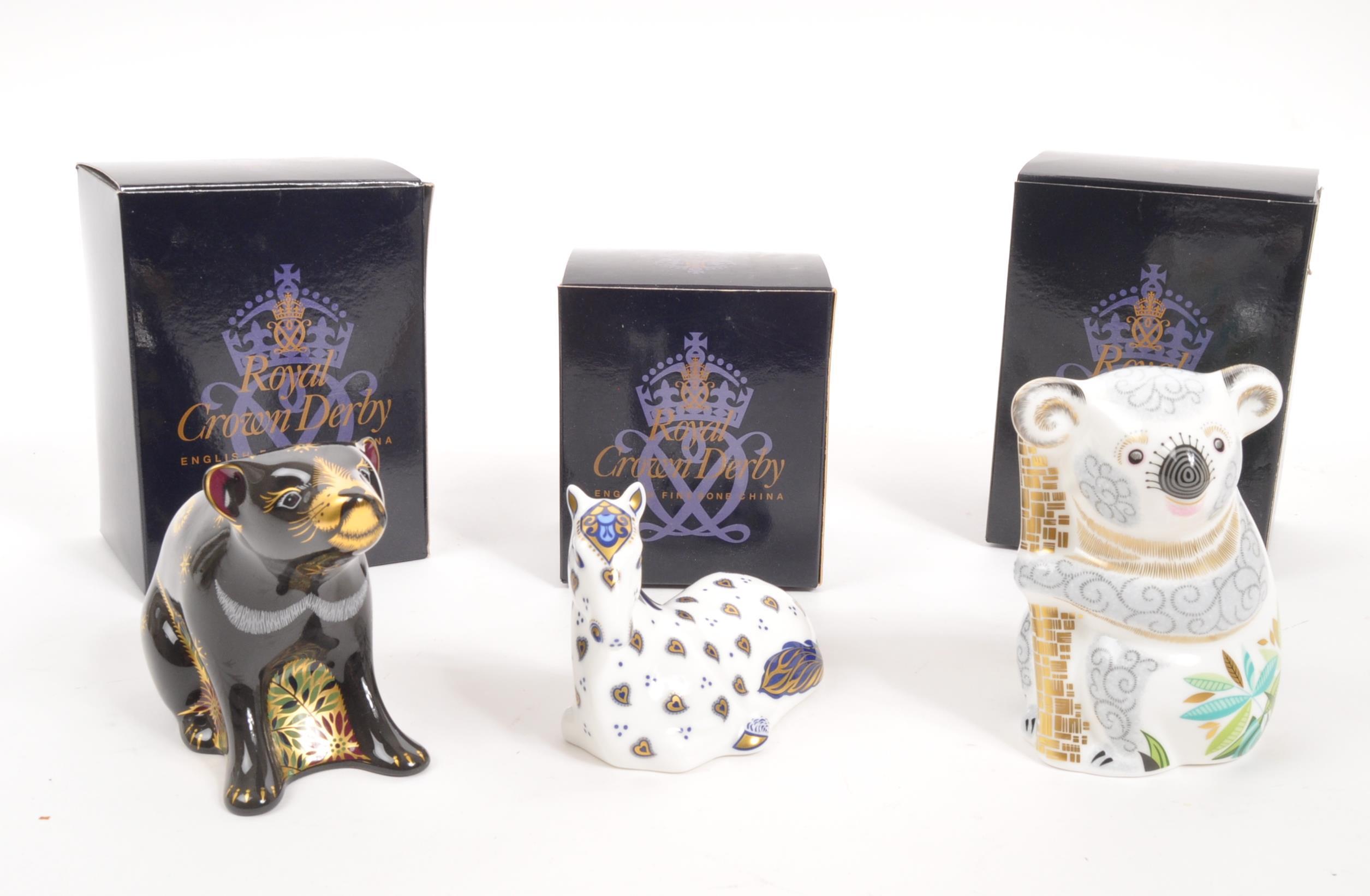 Lot 6 - ROYAL CROWN DERBY - THREE PAPERWEIGHTS INCL.