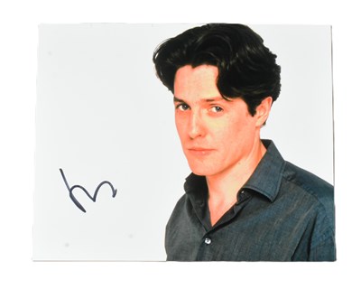 Lot 38 - HUGH GRANT - AUTOGRAPHED 8X10" COLOUR PHOTO - AFTAL