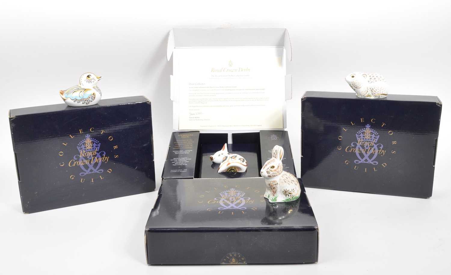Lot 53 - ROYAL CROWN DERBY - FOUR COLLECTORS GUILD PAPERWEIGHTS