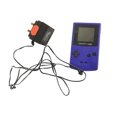 Lot 662 - GAME BOY COLOR - VINTAGE NINTENDO CONSOLE WITH CHARGER & TETRIS