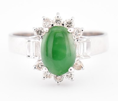 Lot 60 - 18CT WHITE GOLD JADE & DIAMOND HALO RING