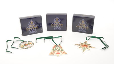 Lot 70 - ROYAL CROWN DERBY - THREE PORCELAIN CHRISTMAS ORNAMENTS