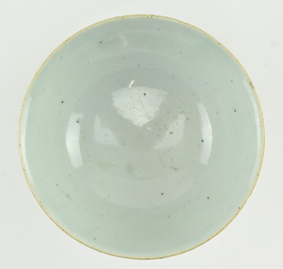 Lot 63 - TWO QING DYNASTY CERAMIC BOWLS 清 紫金釉酱釉青花碗和青釉碗