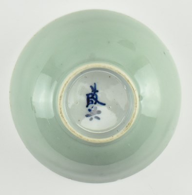 Lot 63 - TWO QING DYNASTY CERAMIC BOWLS 清 紫金釉酱釉青花碗和青釉碗