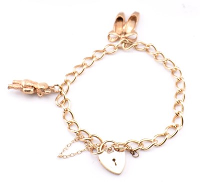 Lot 309 - HALLMARKED 9CT GOLD CHARM BRACELET WITH HEART PADLOCK CLASP