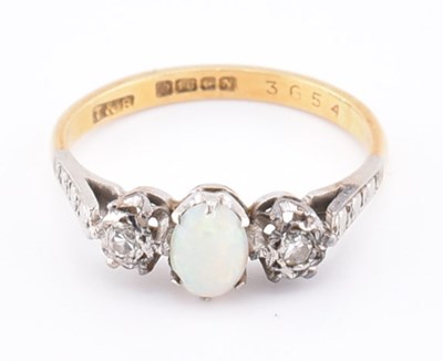 Lot 247 - HALLMARKED 18CT GOLD OPAL & DIAMOND THREE STONE RING