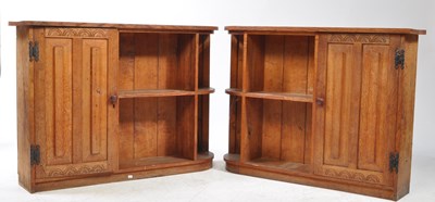 Lot 1038 - PAIR OF ARTS & CRAFTS OAK 20TH CENTURY BOOKCASE CABINET