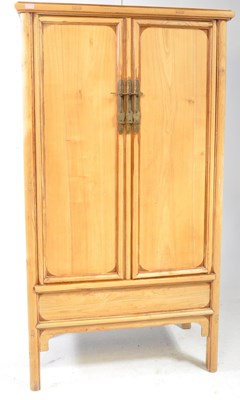 Lot 1026 - LATE 20TH CENTURY CHINESE ELM STYLE WARDROBE