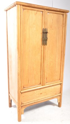 Lot 1045 - LATE 20TH CENTURY CHINESE ELM WARDROBE / MARRIAGE CABINET