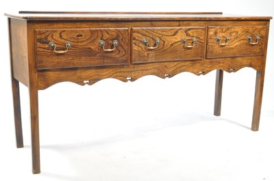 Lot 982 - GEORGE III 19TH CENTURY REVIVAL ELM DRESSER BASE TABLE