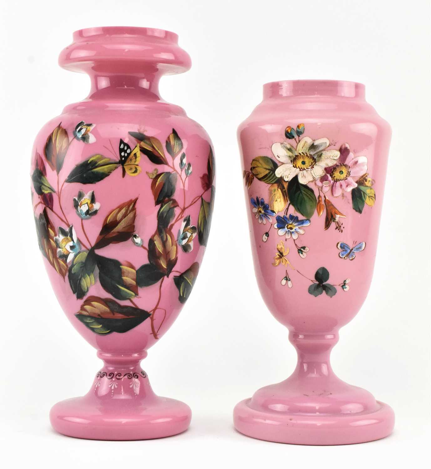 Lot 120 - TWO VICTORIAN OPALINE GLASS VASES IN PINK WITH HAND PAINTED FLORAL DESIGN