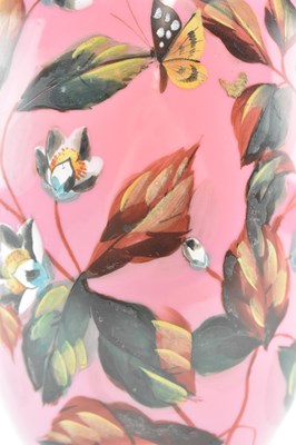 Lot 120 - TWO VICTORIAN OPALINE GLASS VASES IN PINK WITH HAND PAINTED FLORAL DESIGN