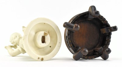 Lot 140 - 19TH CENTURY BISQUE FIGURINE CANDLE HOLDER RAISED ON WOODEN SOCLE BASE