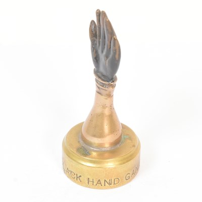 Lot 4 - ST JOHNS BLACK HAND GANG - EARLY 20TH CENTURY BRASS PAPERWEIGHT