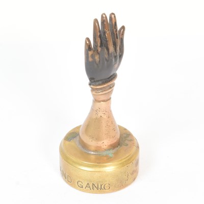 Lot 4 - ST JOHNS BLACK HAND GANG - EARLY 20TH CENTURY BRASS PAPERWEIGHT