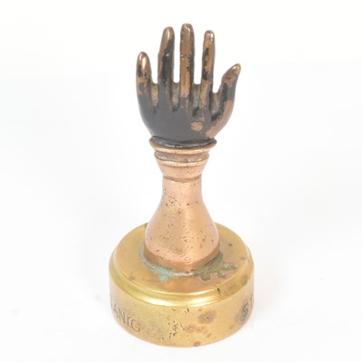 Lot 4 - ST JOHNS BLACK HAND GANG - EARLY 20TH CENTURY BRASS PAPERWEIGHT