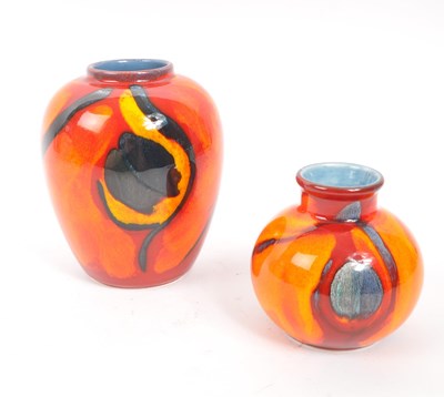 Lot 41 - POOLE POTTERY - TWO VASES IN THE PEACOCK PATTERN