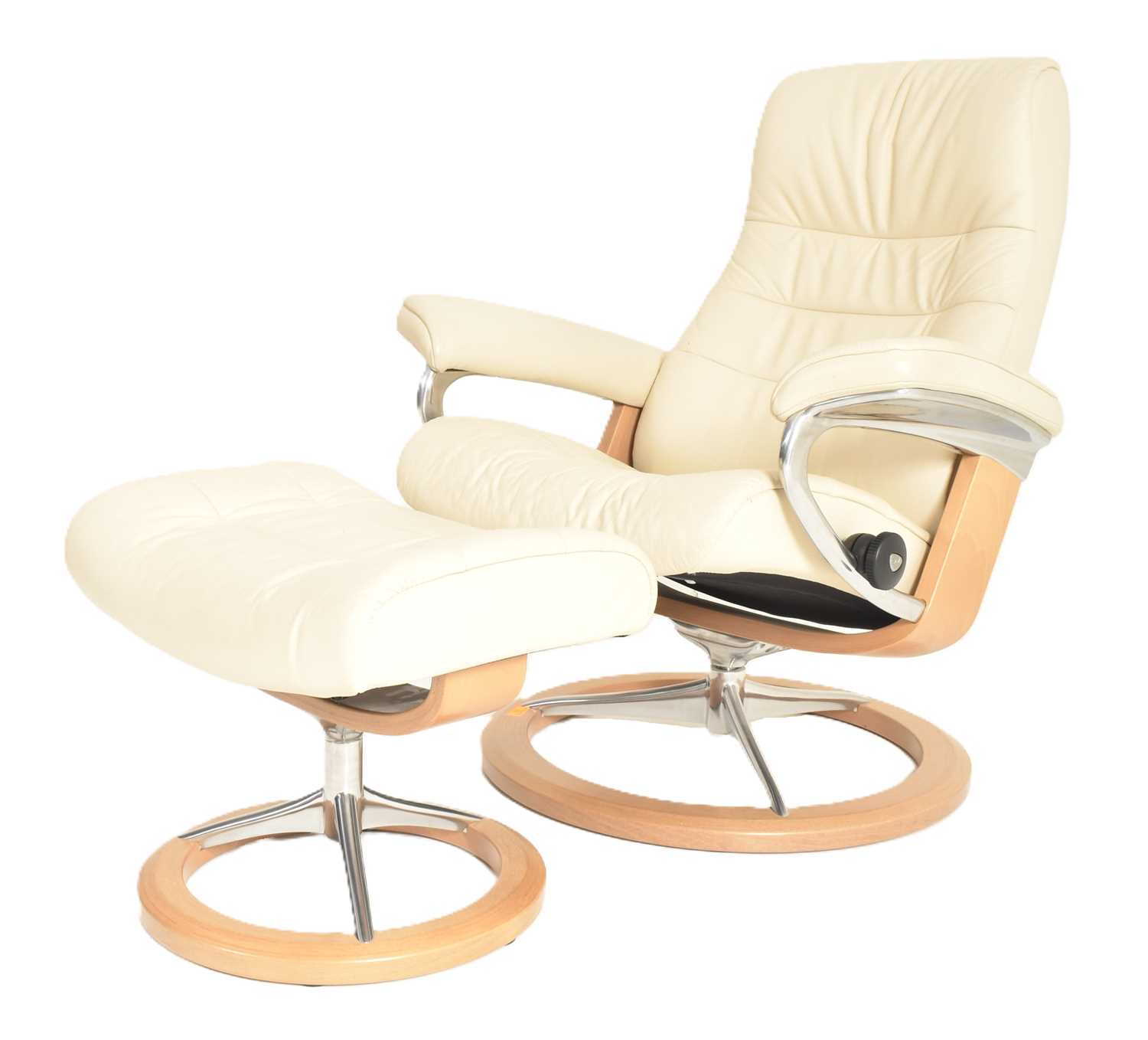 Lot 222 - EKORNES - STRESSLESS - CREAM LEATHER ARMCHAIR AND FOOTREST