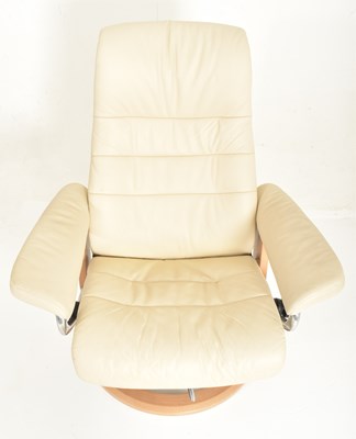 Lot 222 - EKORNES - STRESSLESS - CREAM LEATHER ARMCHAIR AND FOOTREST