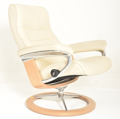 Lot 222 - EKORNES - STRESSLESS - CREAM LEATHER ARMCHAIR AND FOOTREST