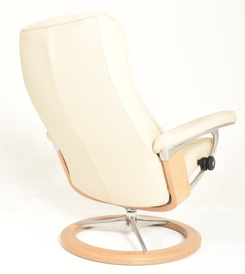 Lot 222 - EKORNES - STRESSLESS - CREAM LEATHER ARMCHAIR AND FOOTREST