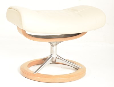 Lot 222 - EKORNES - STRESSLESS - CREAM LEATHER ARMCHAIR AND FOOTREST