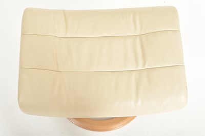 Lot 222 - EKORNES - STRESSLESS - CREAM LEATHER ARMCHAIR AND FOOTREST