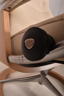 Lot 222 - EKORNES - STRESSLESS - CREAM LEATHER ARMCHAIR AND FOOTREST