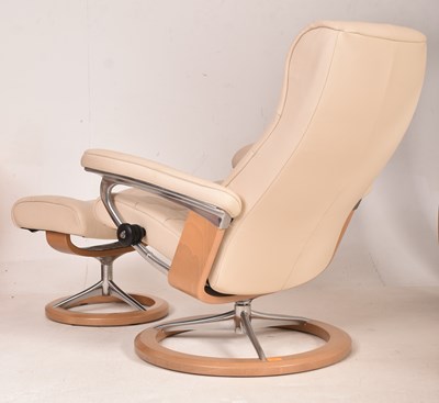 Lot 222 - EKORNES - STRESSLESS - CREAM LEATHER ARMCHAIR AND FOOTREST