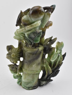 Lot 181 - CARVED JADE BOULDER WITH EIGHT TAOIST EMBLEMS 玉雕暗八仙