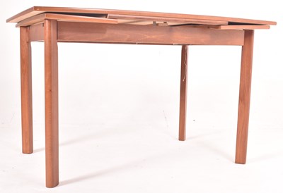 Lot 555 - DANISH MODERN DESIGN - MID CENTURY TEAK EXTENDING DINING TABLE