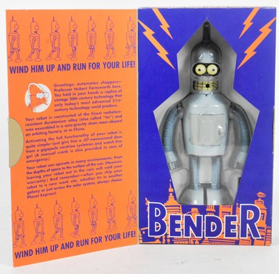 Lot 743 - FUTURAMA - TINPLATE WALKING BENDER CLOCKWORK ROBOT