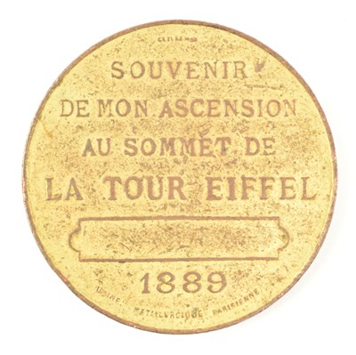 Lot 59 - LA TOUR EIFFEL - 1889 SOUVENIR TOKEN FROM CLIMBING THE EIFFEL TOWER