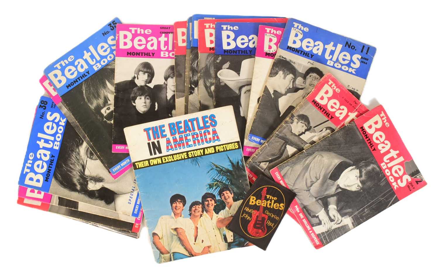 Lot 101 - THE BEATLES - COLLECTION OF BEATLES MONTHLY MAGAZINES & CLOTH PATCH