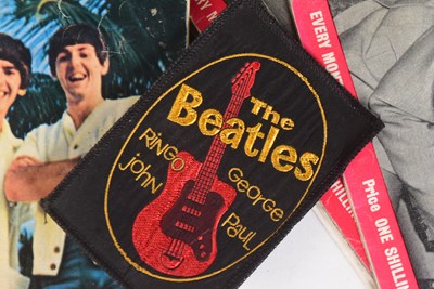 Lot 101 - THE BEATLES - COLLECTION OF BEATLES MONTHLY MAGAZINES & CLOTH PATCH