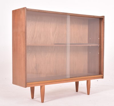 Lot 587 - BRITISH MODERN DESIGN - RETRO MID CENTURY TEAK & GLASS BOOKCASE CABINET