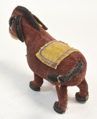 Lot 317 - VINTAGE 1950S WIND-UP FELT DONKEY TOY MADE IN JAPAN