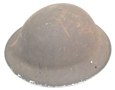 Lot 354 - WWII SECOND WORLD WAR BRODIE HELMET WITH GERMAN GRAFFITI