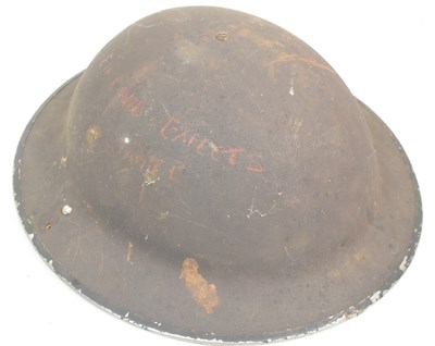 Lot 354 - WWII SECOND WORLD WAR BRODIE HELMET WITH GERMAN GRAFFITI
