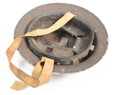 Lot 354 - WWII SECOND WORLD WAR BRODIE HELMET WITH GERMAN GRAFFITI