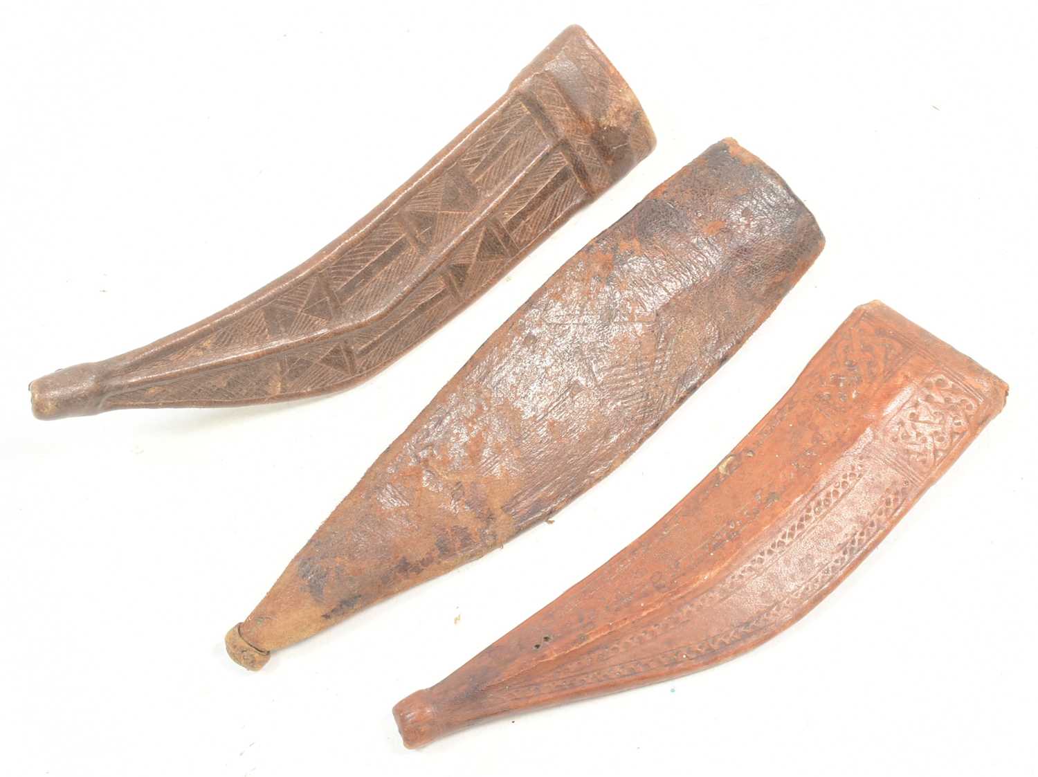 Lot 242 - THREE EAST AFRICAN AFAR / DANAKIL PEOPLE DAGGER SHEATHS