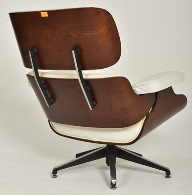 Lot 50 - AFTER CHARLES & RAY EAMES - HERMAN MILLER STYLE ARMCHAIR