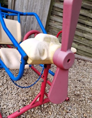 Lot 255 - VINTAGE TOY PLAYGROUND SEVEN PERSON AEROPLANE SEE SAW RIDE, CHROME FRAME & PLASTIC FITTINGS